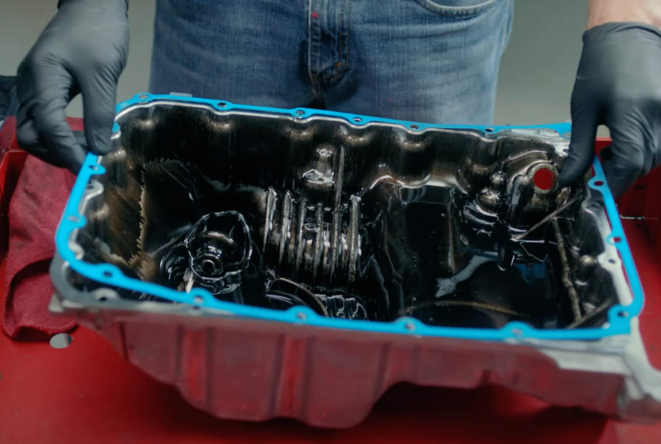 Auto tech pressing oil pan in case Auto tech pressing oil pan in case